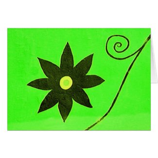 black flower on green card